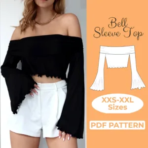 person with long hair white shorts and a self made top from a bell sleeve top sewing pattern