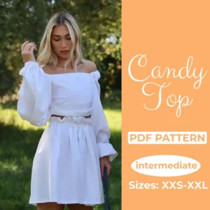 Girl wearing a white top that was created from a Puff Sleeve Top Sewing Pattern