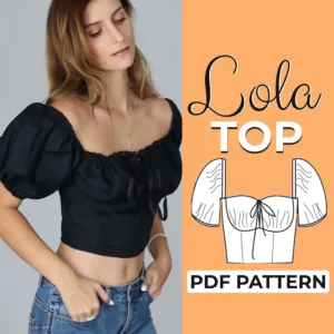 Model wearing a black puff sleeve top made from a sewing pattern