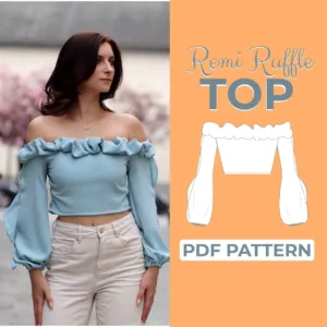 person wearing a light blue top that she made herself with this ruffle blouse sewing pattern